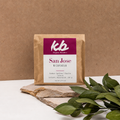 KB Coffee Roasters San José coffee bag on kraft backdrop